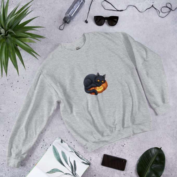 Black cat on pumpkin sweatshirt Halloween gothic sweatshirt Gothic cat sweatshirt Cozy Halloween apparel Cat lover Halloween gift